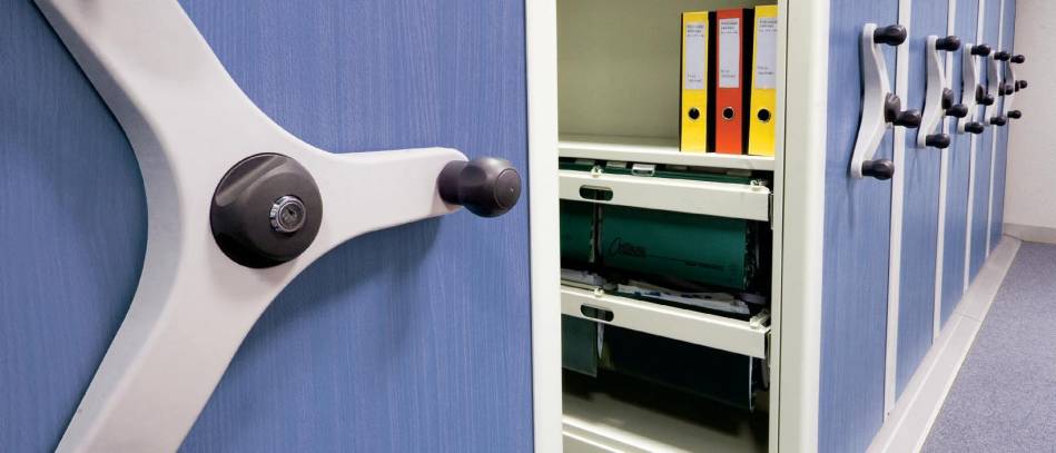 Movable shelves on rollers for easy document storage